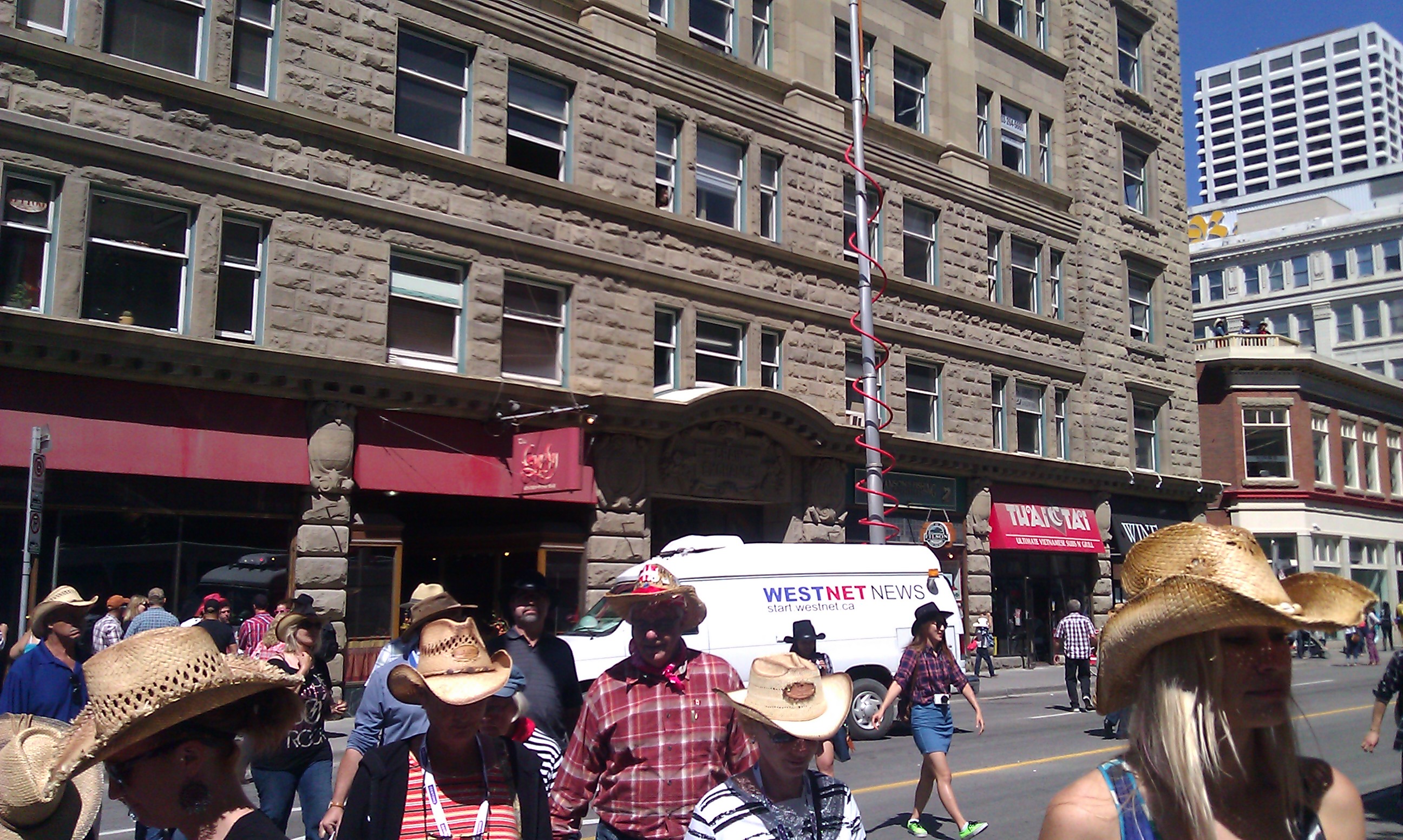 WestNet News van on Calgary streets during Stampede, July 2013 — weeks after the flood